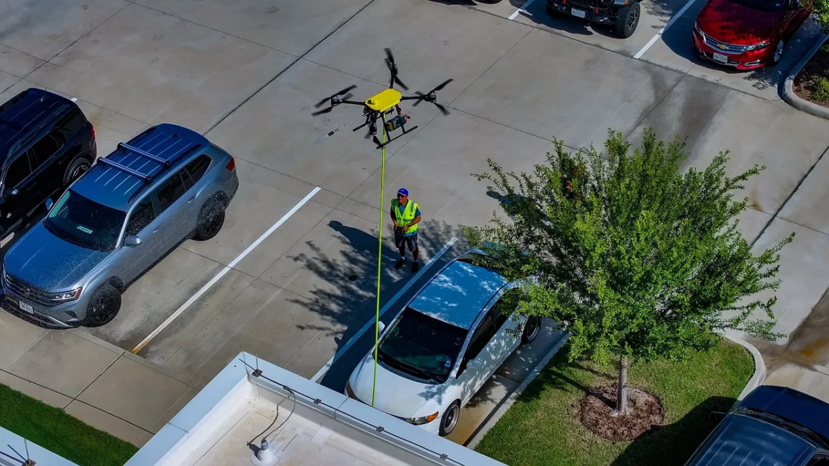 FAA-certified operators use drone cleaning technology with a soft wash approach to clean commercial buildings.